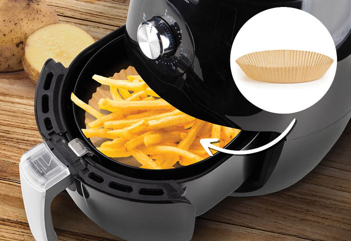 Nu vrei să pierzi timpul curățând friteuza cu aer cald? Folosește hârtie de copt!